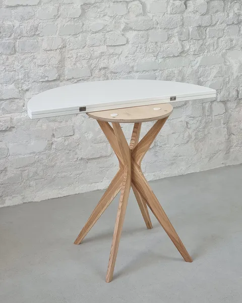 NRGBTJ_E1 jubi half round extendable table white half-open_wynik.webp
